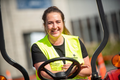 Photo of contestant driving tractor