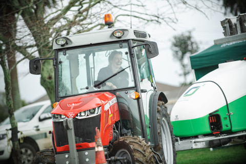 Photo of contestant driving a tractor